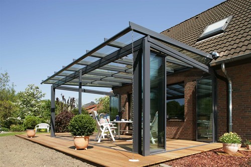 glass canopy extension on wooden decking