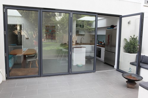 kitchen bifold doors connecting to same level patio