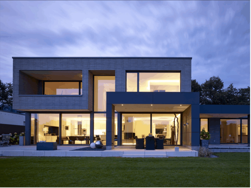 Modern home featuring structural glass walls and minimal frame glazing system in London